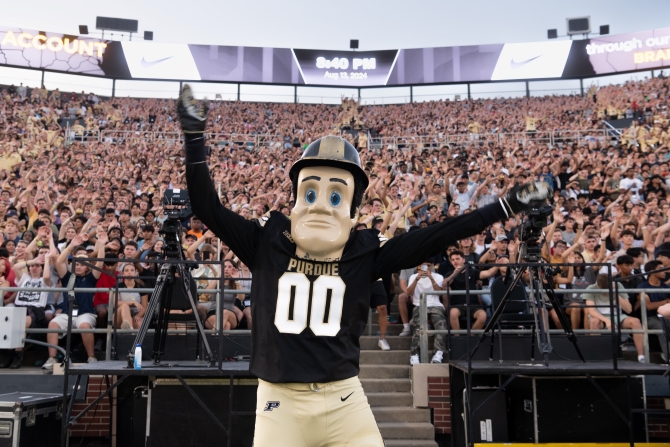 Students in stadium with Purdue Pete
