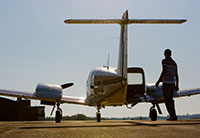 Male student with airplanes