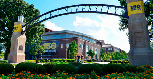 Purdue arch with 150 Years of Giant Leaps banner